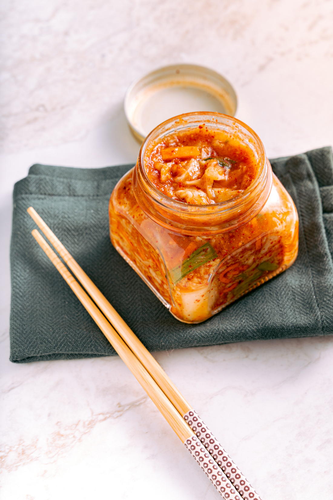 Container of kimchi, a fermented korean dish