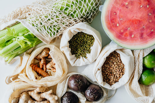 A variety of foods such as seeds, legumes, beans, fruits (watermelon, lime), spices (ginger, turmeric), and vegetables (celery, onions)