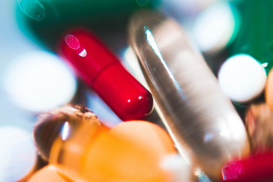 Blurred image of a variety of pills and medicine